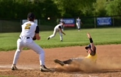  Bryson-Booher-sends-the-ball-to-third-baseman-Lucas Edmonds as-4-Blue-Devil-slides-into-the-third.-The-play-was-called-safe. 