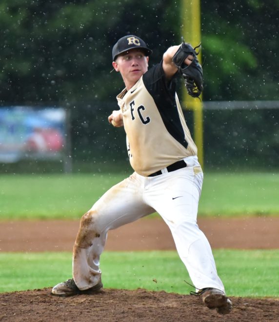 Second pitcher of the night, Bryson Booher pitching in the rain.